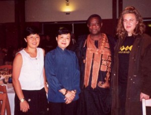 Cheryl (2nd from left) with John Atta Mills (3rd from left and friends in 2002.